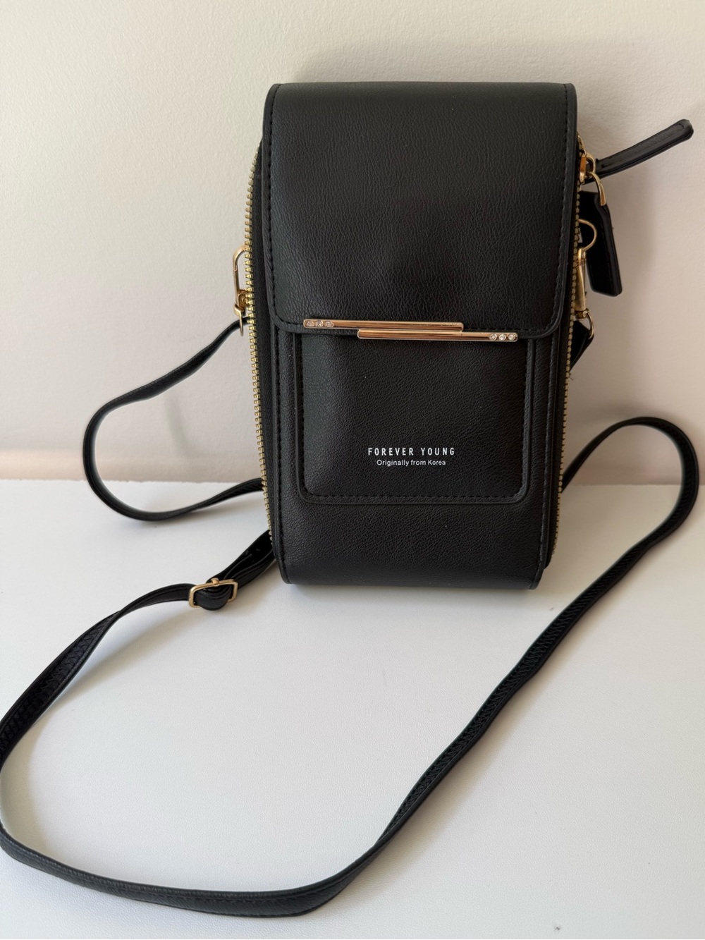 Forever Young Black Faux Leather Crossbody Phone Pouch with Gold Accent